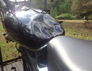 motorcycle accident exam picture gas tank damage